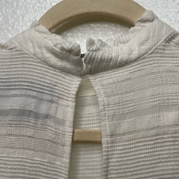 Reformation Cream Mock neck long sleeve blouse xxs
Purchased from The Real Real - Picture 10 of 14